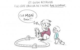 père jouant avec jeu de ses enfants